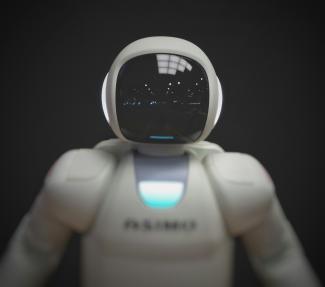 white robot wallpaper by Possessed Photography courtesy of Unsplash.